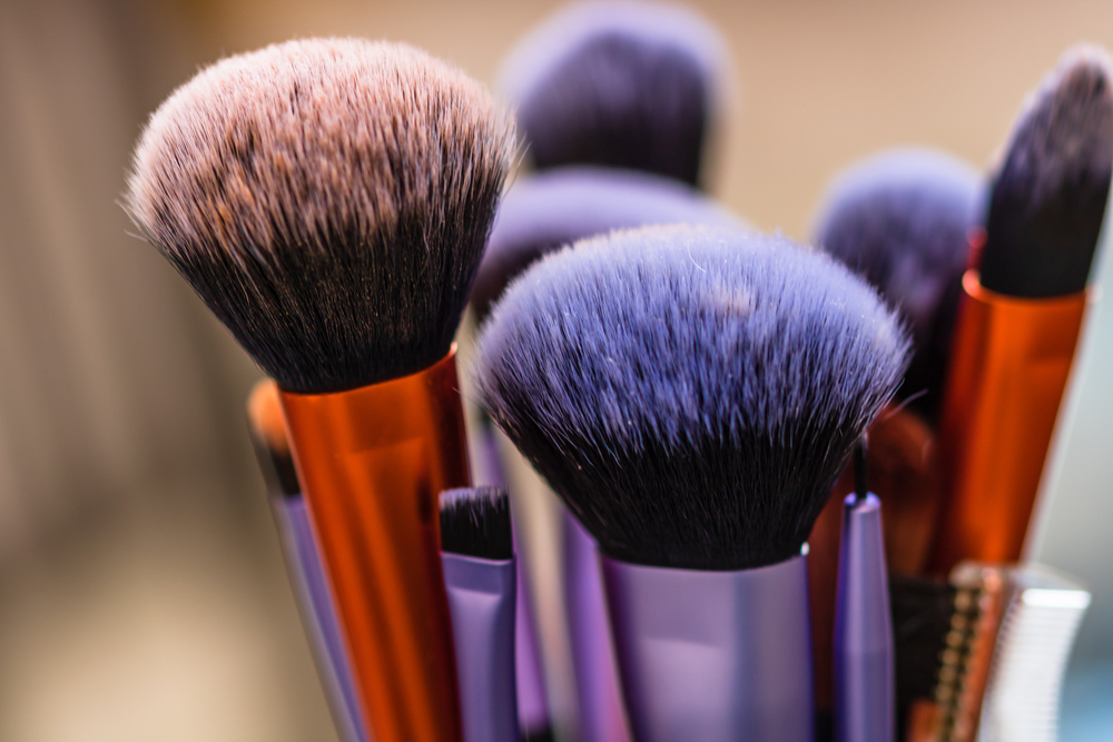 close up of makeup brushes grouped together